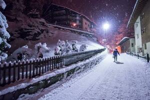 snowy streets of the Alpine mountain village photo