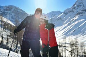 people group on snow at winter season photo