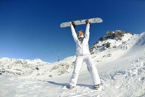 skiing on fresh snow at winter season at beautiful sunny day photo