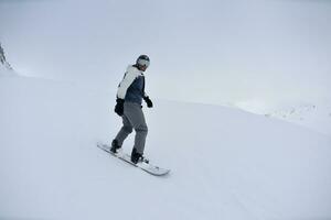 skiing on fresh snow at winter season at beautiful sunny day photo