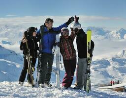 people group on snow at winter season photo