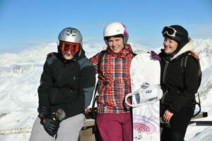 people group on snow at winter season photo