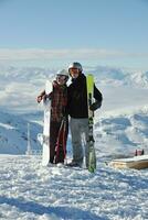 people group on snow at winter season photo