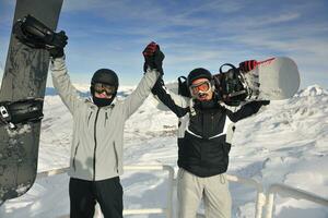 people group on snow at winter season photo