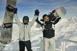 people group on snow at winter season photo