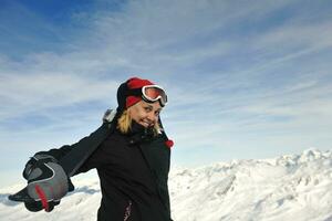 woman winter snow skiskiing on on now at winter season photo