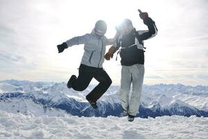 people group on snow at winter season photo