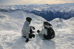 people group on snow at winter season photo