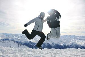 people group on snow at winter season photo