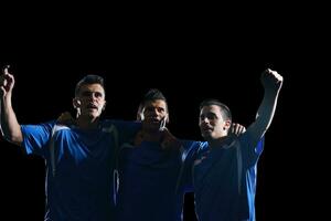 soccer players celebrating victory photo