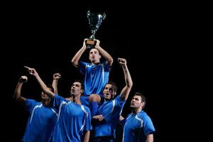 soccer players celebrating victory photo