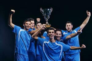 jugadores de fútbol celebrando la victoria foto