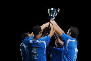 soccer players celebrating victory photo