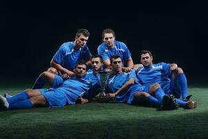 soccer players celebrating victory photo