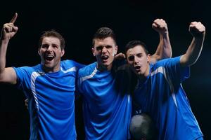 soccer players celebrating victory photo