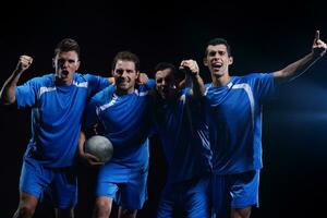 soccer players celebrating victory photo