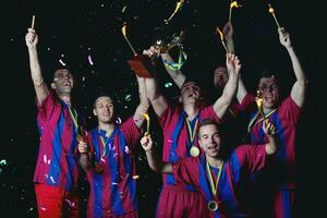 soccer players celebrating victory photo