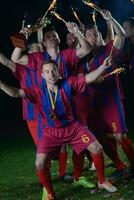 soccer players celebrating victory photo