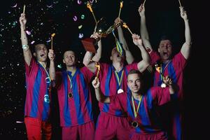 soccer players celebrating victory photo