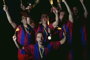 soccer players celebrating victory photo