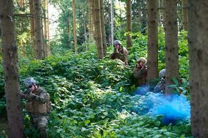 Modern warfare Soldiers  Squad  in battle photo