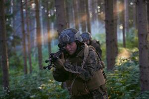 Modern warfare Soldiers  Squad  in battle photo