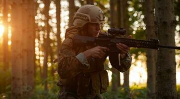 soldier in action aiming  on weapon  laser sight optics photo