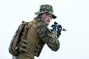 soldier in action aiming laseer sight optics photo