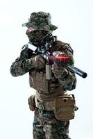 soldier in action aiming laseer sight optics photo