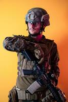 modern soldier against yellow background photo