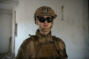 modern warfare soldier portrait in urban environment photo