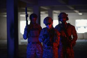 soldier squad team portrait in urban environment colored lightis photo