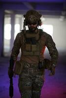 modern warfare soldier in urban environment photo