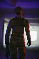 modern warfare soldier in urban environment photo