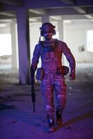 modern warfare soldier in urban environment photo