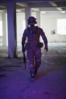 modern warfare soldier in urban environment photo