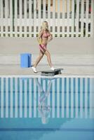 fitness exercise at poolside photo