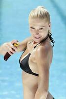 beautiful woman relax on swimming pool photo