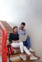 students use modern technology in school to create projects photo