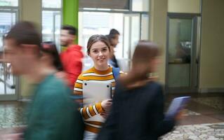 famel student with modern technology in school photo