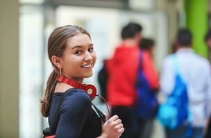 famel student with modern technology in school photo