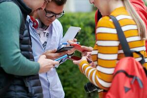 students in modern school using modrn technology photo