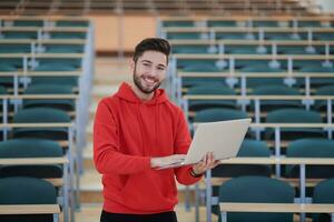 the student uses a notebook in school photo