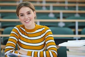 student taking notes for school class photo