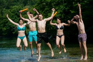 summer joy friends having fun on river photo