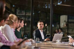 Business Team At A Meeting at modern office building photo