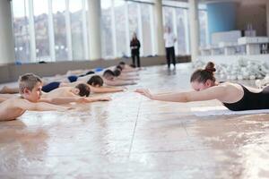 happy children group  at swimming pool photo