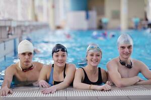 happy children group  at swimming pool photo