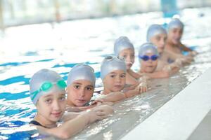 children group  at swimming pool photo