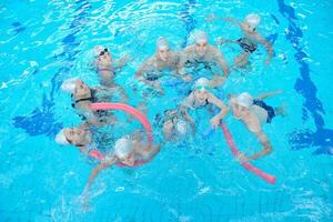 children group  at swimming pool photo